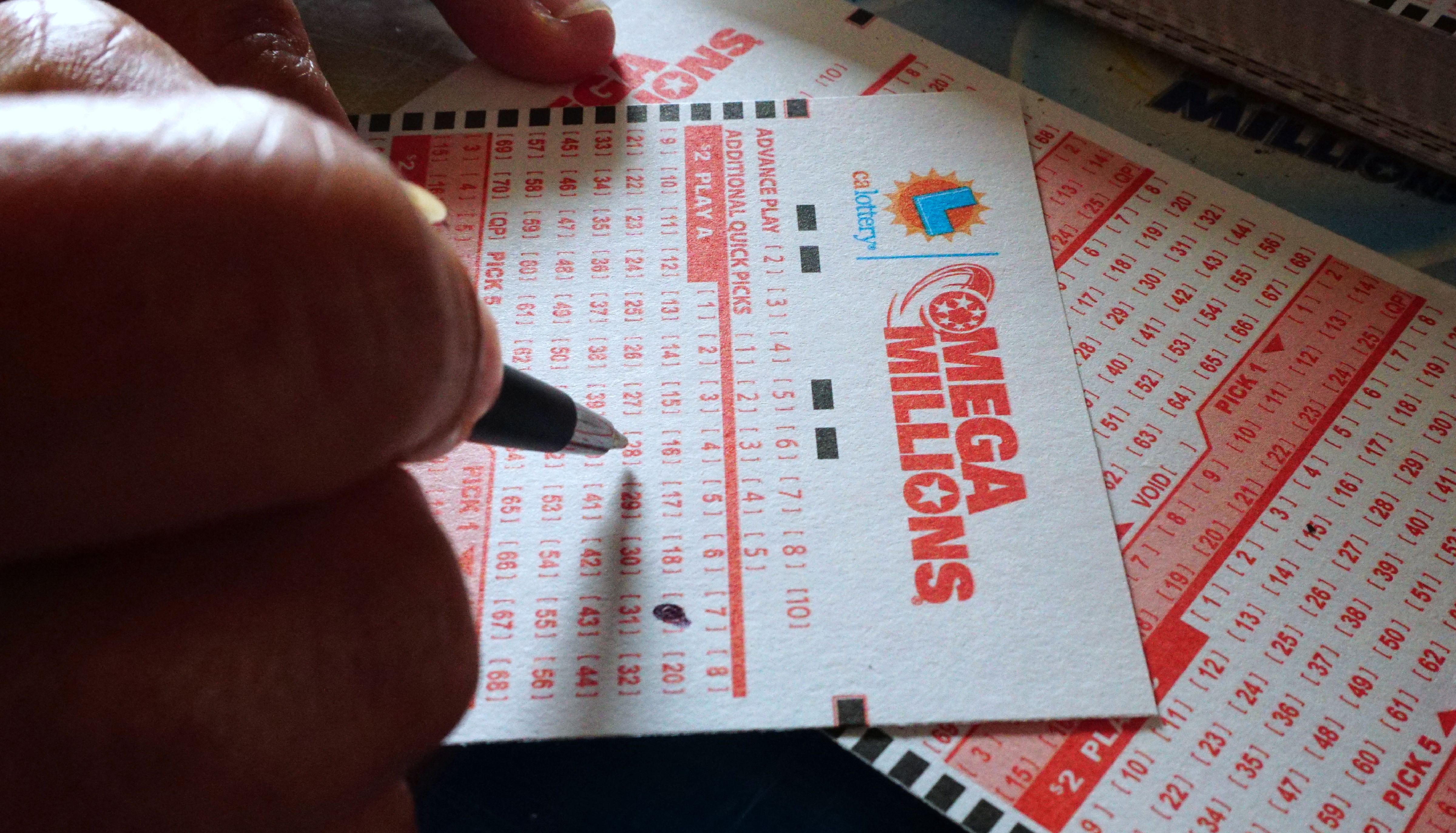 Joining an office lottery pool for the $910M Mega Millions jackpot? What to know